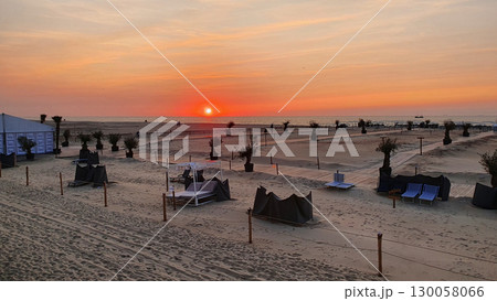 Panoramic beach landscape. Inspire tropical beach seascape horizon. Orange and golden sunset sky and relaxing sunlight summer mood. Vacation travel holiday banner. Panoramic beach landscape. Inspire tropical beach seascape horizon. Orange and golden sunset sky and relaxing sunlight summer mood. Vacation travel holiday banner. 130058066