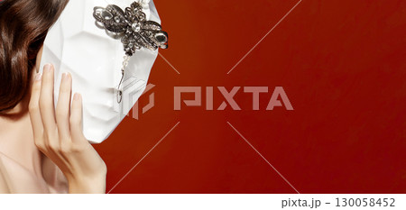 Beautiful Woman Wearing Mask. Mysterious Girl with Nice Masquerade Accessories. Carnival costume. Valentines day style 130058452