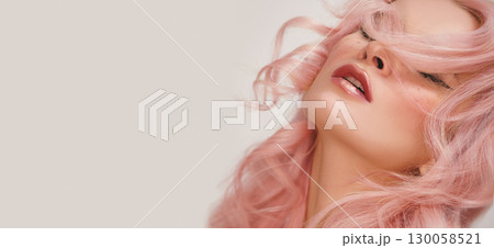 Soft-Girl Style with Trend Pink Flying Hair, Fashion Make-up. Blond Woman Face with Freckles, Blush Rouge, Rose Hair Soft-Girl Style with Trend Pink Flying Hair, Fashion Make-up. Blond Woman Face with Freckles, Blush Rouge, Rose Hair 130058521