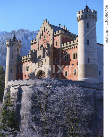 Historic castle stands majestically against a winter backdrop in Bavaria, showcasing stunning architecture and scenic beauty Historic castle stands majestically against a winter backdrop in Bavaria, showcasing stunning architecture and scenic beauty 130060456