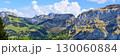 Breathtaking mountain landscape with lush greenery and blue skies in summer 130060884