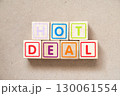 Alphabet letter block in word hot deal on wood background 130061554