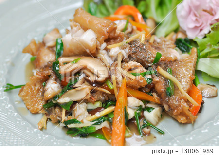 stir fried fish , stir fried bass or stir fried mussel with carrot and ginger stir fried fish , stir fried bass or stir fried mussel with carrot and ginger 130061989