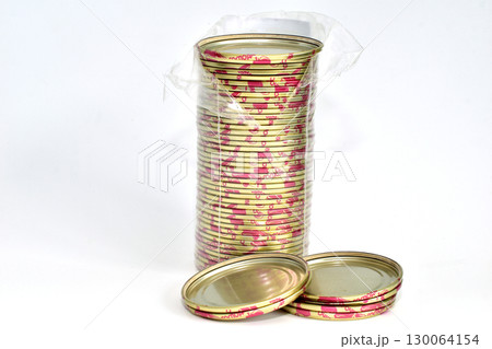 A stack of metal lids. A stack of metal lids. 130064154