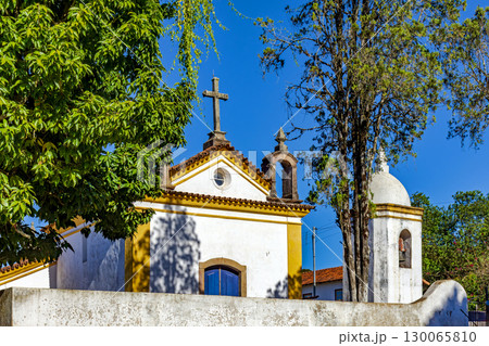 Old church with stone crucifix 130065810