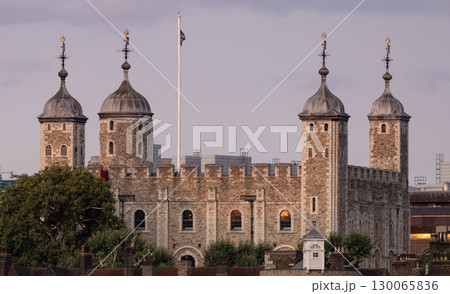 Tower of London with lowered flag at sunset, London, United Kingdom Tower of London with lowered flag at sunset, London, United Kingdom 130065836
