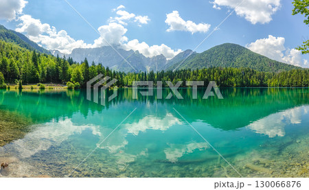 Fusine Lakes Pristine Turquoise Waters Reflecting Julian Alps in Friuli Venezia Giulia Italy 130066876