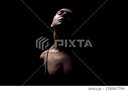 Female silhouette in dark. Beautiful passion Girl 130067764