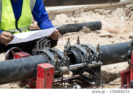 Engineers are developing tools to connect water pipes. 130068232