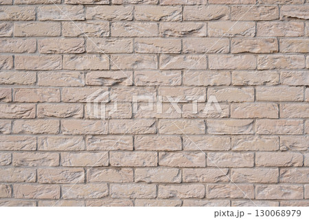 Beige old brick wall background grunge texture Beige old brick wall background grunge texture 130068979