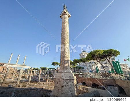 ROME, ITALY - AUGUST 01, 2025 Trajan's Column that commemorates Roman emperor victory in the Dacian Wars, located in Trajan's Forum with ancient ruins and classical architecture surrounding it ROME, ITALY - AUGUST 01, 2025 Trajan's Column that commemorates Roman emperor victory in the Dacian Wars, located in Trajan's Forum with ancient ruins and classical architecture surrounding it 130069663