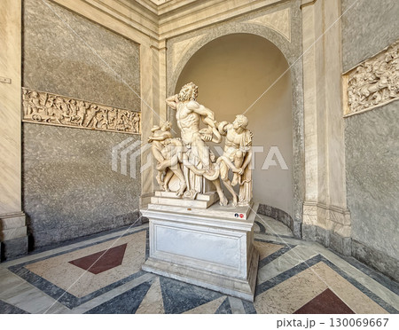 Vatican City, ROME, ITALY - AUGUST 02, 2025 Laocoon and His Sons marble statue prominently displayed on a pedestal inside Pio-Clementino museum. The sculpture depicts three men attacked by serpents Vatican City, ROME, ITALY - AUGUST 02, 2025 Laocoon and His Sons marble statue prominently displayed on a pedestal inside Pio-Clementino museum. The sculpture depicts three men attacked by serpents 130069667
