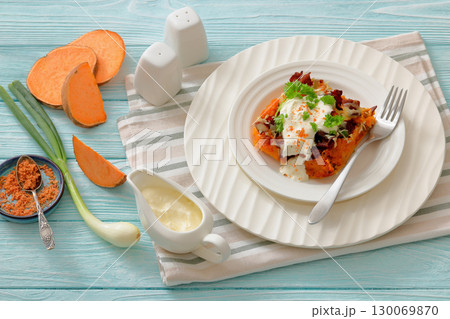 sweet potato casserole with bacon, cheese, onion 130069870