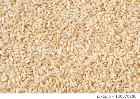 Close up of brown rice grains filling the frame for a natural and wholesome Close up of brown rice grains filling the frame for a natural and wholesome 130070180