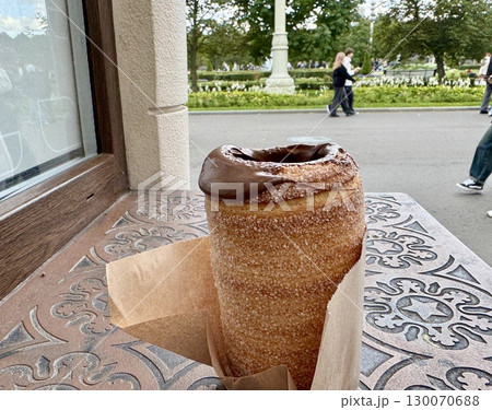 sweet trdelnik with nutella. High quality photo sweet trdelnik with nutella. High quality photo 130070688