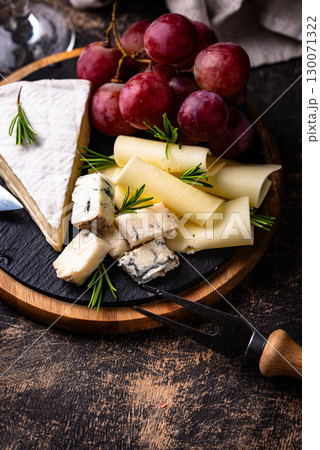 Different types of cheese, wine and grapes Different types of cheese, wine and grapes 130071322