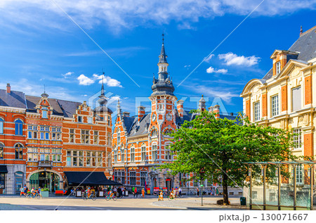 Old Post Office House Leuven brick building in Leuven city historical center in sunny summer day, Flemish Region, Flemish Brabant province, Belgium 130071667