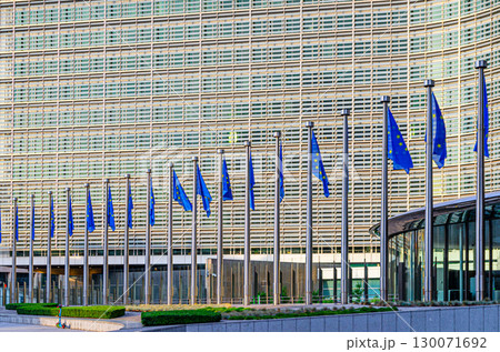 Berlaymont building the headquarters of the European Commission and EU flags in European Quarter of Brussels city, Brussels-Capital Region, Belgium 130071692