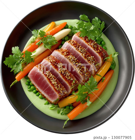 Lightly Seared Yellowfin Tuna with Sesame Crust and Wasabi Pea Puree Garnished with Pickled Carrots and Fresh Herbs 130077905