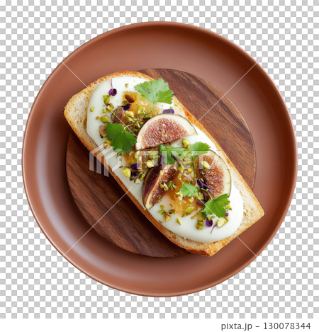 Smooth Foie Gras Mousse Canape on Crisp Brioche with Fig Gel and Crushed Pistachios Garnish 130078344