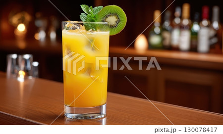 Vibrant Tropical Cocktail on Bar Counter with Fresh Ingredients and Delicate Garnish 130078417
