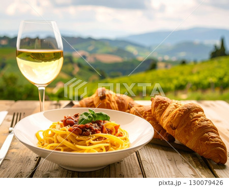 Delicious Italian spaghetti with tomato sauce and basil on a white plate ready for a gourmet dinner 130079426