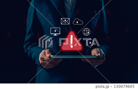 Businesswoman receives cyber security warning alert on smartphone and computer, data vulnerability, compromised information illegal, concept of digital threat protection. system detects network hack Businesswoman receives cyber security warning alert on smartphone and computer, data vulnerability, compromised information illegal, concept of digital threat protection. system detects network hack 130079605