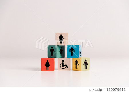 Concept of diversity, inclusion, equality is highlighted in team setup, wooden elements, symbolizing leadership, authority, influence, strong communication skills, inclusive organizational structure. Concept of diversity, inclusion, equality is highlighted in team setup, wooden elements, symbolizing leadership, authority, influence, strong communication skills, inclusive organizational structure. 130079611