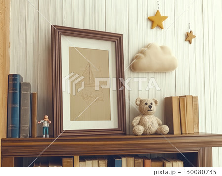 Decorative shelf with teddy bear, framed sketch, and cloud-shaped accent in cozy interior 130080735
