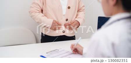 Elderly woman Patient consultation with doctor for Colon disease, Large Intestine, Colorectal cancer, Ulcerative colitis, Diverticulitis, Irritable bowel syndrome, Digestive system and Healthcare 130082351