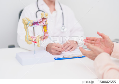 Elderly woman Patient consultation with doctor for Colon disease, Large Intestine, Colorectal cancer, Ulcerative colitis, Diverticulitis, Irritable bowel syndrome, Digestive system and Healthcare Elderly woman Patient consultation with doctor for Colon disease, Large Intestine, Colorectal cancer, Ulcerative colitis, Diverticulitis, Irritable bowel syndrome, Digestive system and Healthcare 130082355
