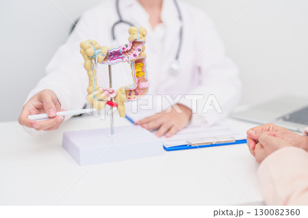 Elderly woman Patient consultation with doctor for Colon disease, Large Intestine, Colorectal cancer, Ulcerative colitis, Diverticulitis, Irritable bowel syndrome, Digestive system and Healthcare Elderly woman Patient consultation with doctor for Colon disease, Large Intestine, Colorectal cancer, Ulcerative colitis, Diverticulitis, Irritable bowel syndrome, Digestive system and Healthcare 130082360
