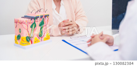 woman Patient consultation Dermatologist with anatomy of skin and hair. Skin disease and Hair loss, Systemic Lupus Erythematosus or SLE, world lupus day, May Melanoma and Skin Cancer Awareness month woman Patient consultation Dermatologist with anatomy of skin and hair. Skin disease and Hair loss, Systemic Lupus Erythematosus or SLE, world lupus day, May Melanoma and Skin Cancer Awareness month 130082384