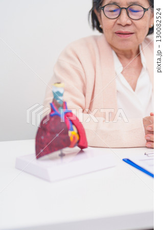 Doctor with Respiratory system. Elderly Patient consultation medical health for Lung Cancer, Asthma, Chronic Obstructive Pulmonary, Bronchitis, Emphysema, Cystic Fibrosis, Bronchiectasis, Pneumonia 130082524