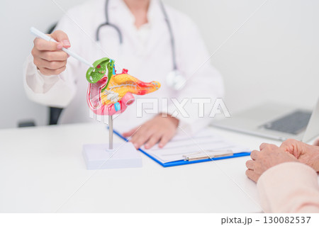 Elderly Patient consultation with doctor for Pancreas, Gallbladder, Bile Duct, Duodenum, Small intestine. Pancreatic cancer, Acute and Chronic pancreatitis, Digestive system and medical healthcare 130082537