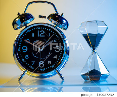 Alarm Clock and Hourglass Alarm Clock and Hourglass 130087232