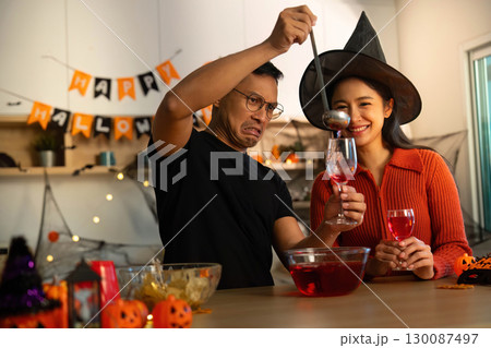 Halloween Party: Friends Enjoying Festive Drinks 130087497