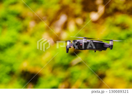 Drone flying over green nature Drone flying over green nature 130089321