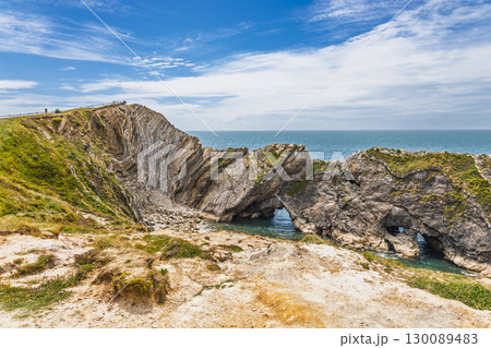 Lulworth Cove coastline and Stair Hole limestone cliffs on the Jurassic Coast, Dorset 130089483