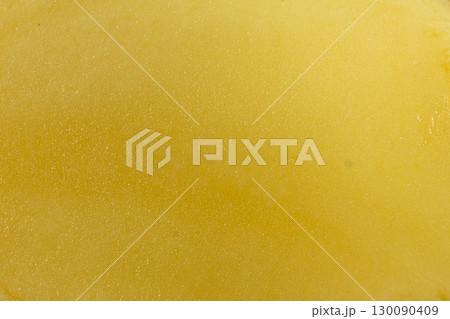 Fresh Cut Potato Macro Close-Up Yellow Background. 130090409