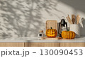 Halloween celebration decor with carved pumpkins and cozy kitchen vibes. 3D render illustration 130090453