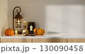 Charming Halloween scene with pumpkins and candles for a cozy atmosphere. 3D render illustration 130090458