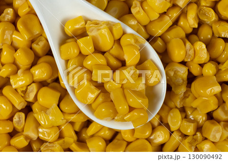 Close-Up Of Sweet Canned Corn Kernels In Spoon. 130090492