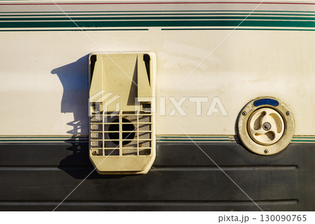 Camper detail. Chimney ventilation plate and water tank cap. Camper detail. Chimney ventilation plate and water tank cap. 130090765