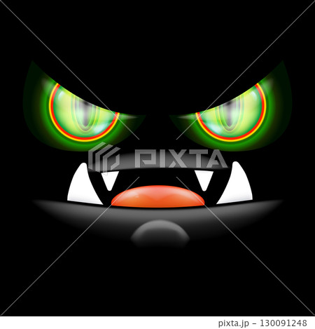 A fearsome monster with sharp fangs and piercing green eyes stares out of the shadows, creating a scary Halloween background with an open mouth and shark teeth 130091248