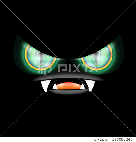 A scary monster with glowing green eyes and razor-sharp teeth peers out of the darkness, a frightful Halloween backdrop featuring an open mouth and fangs 130091249