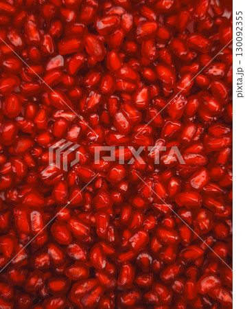 Juicy pomegranate seeds creating vibrant red background for rosh hashanah 130092355