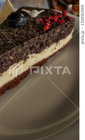 Delicious poppy seed cake with blueberry and raspberry topping in slovakia strbske pleso, high tatras 130092848