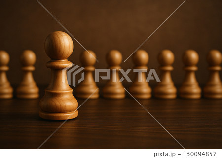 Leadership expectation, a chess pawn leading the rest of the other chess pawns 130094857