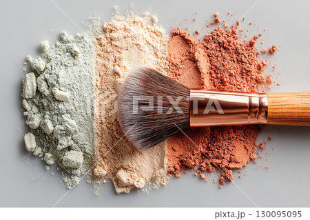 Beauty brand. Flat lay of makeup brush placed next to a color palette on white background. Beauty brand. Flat lay of makeup brush placed next to a color palette on white background. 130095095